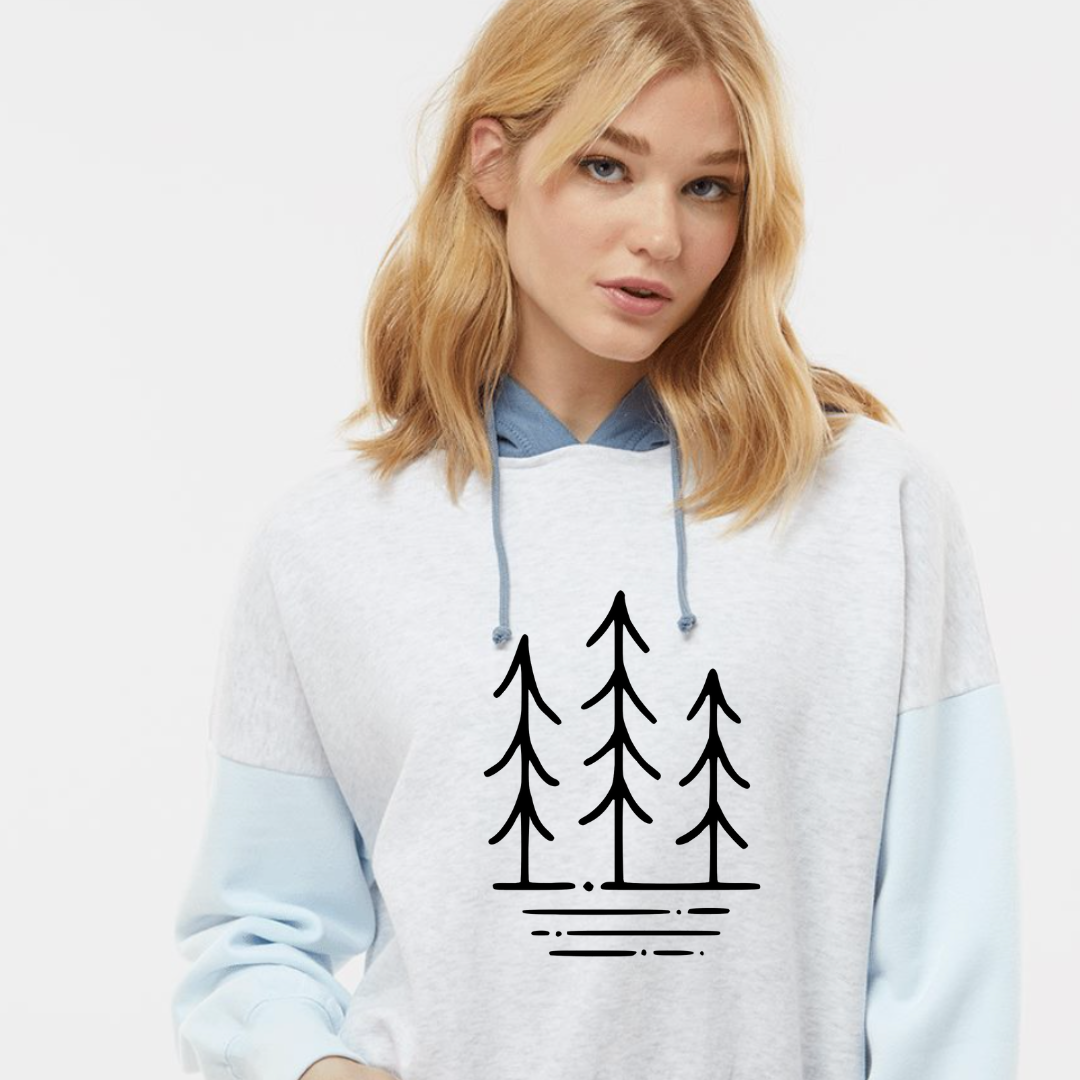 Three Trees Cropped Hooded Sweatshirt - arctic blue on a female model posing with a white background