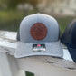 Outdoor Lake Hat - front view of the gray with black mesh - outdoor leather patch