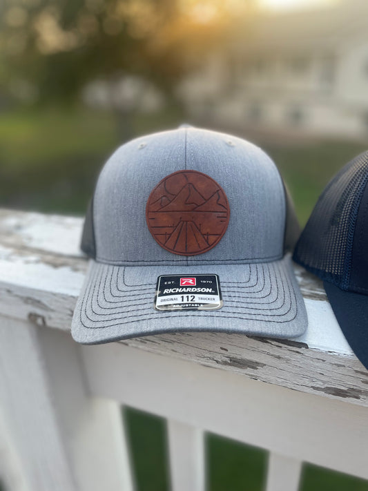 Outdoor Lake Hat - front view of the gray with black mesh - outdoor leather patch