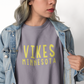 Minnesota Vikings Crewneck Sweatshirt on a model with a jean jacket over the top on a model