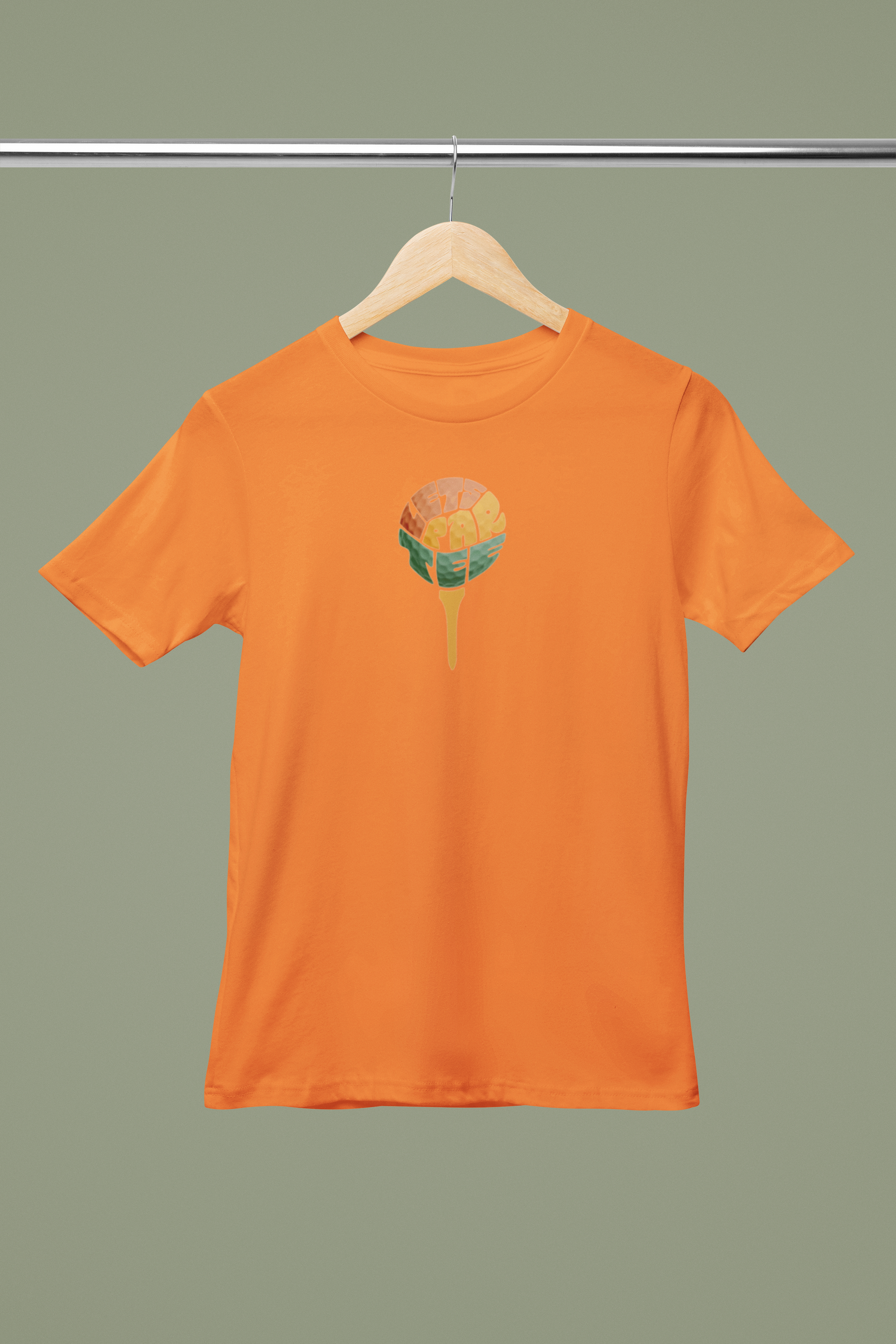 Orange t-shirt with a colorful graphic on a hanger against a green background