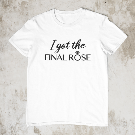 I Got The Final Rose Bride T-Shirt laid flat on a tan patterned background