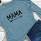 Mama Long Sleeve Shirt in blue laid out flat with white tennis shoes, shorts and sunglasses next to it.