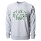 Luck Of The Irish - Pull Over Sweatshirt in a heather light gray. Luck Of The Irish quote on the sweatshirt is a medium green with cute leaves enclosing the design and a small four leaf clover. This is the front view of the sweatshirt.