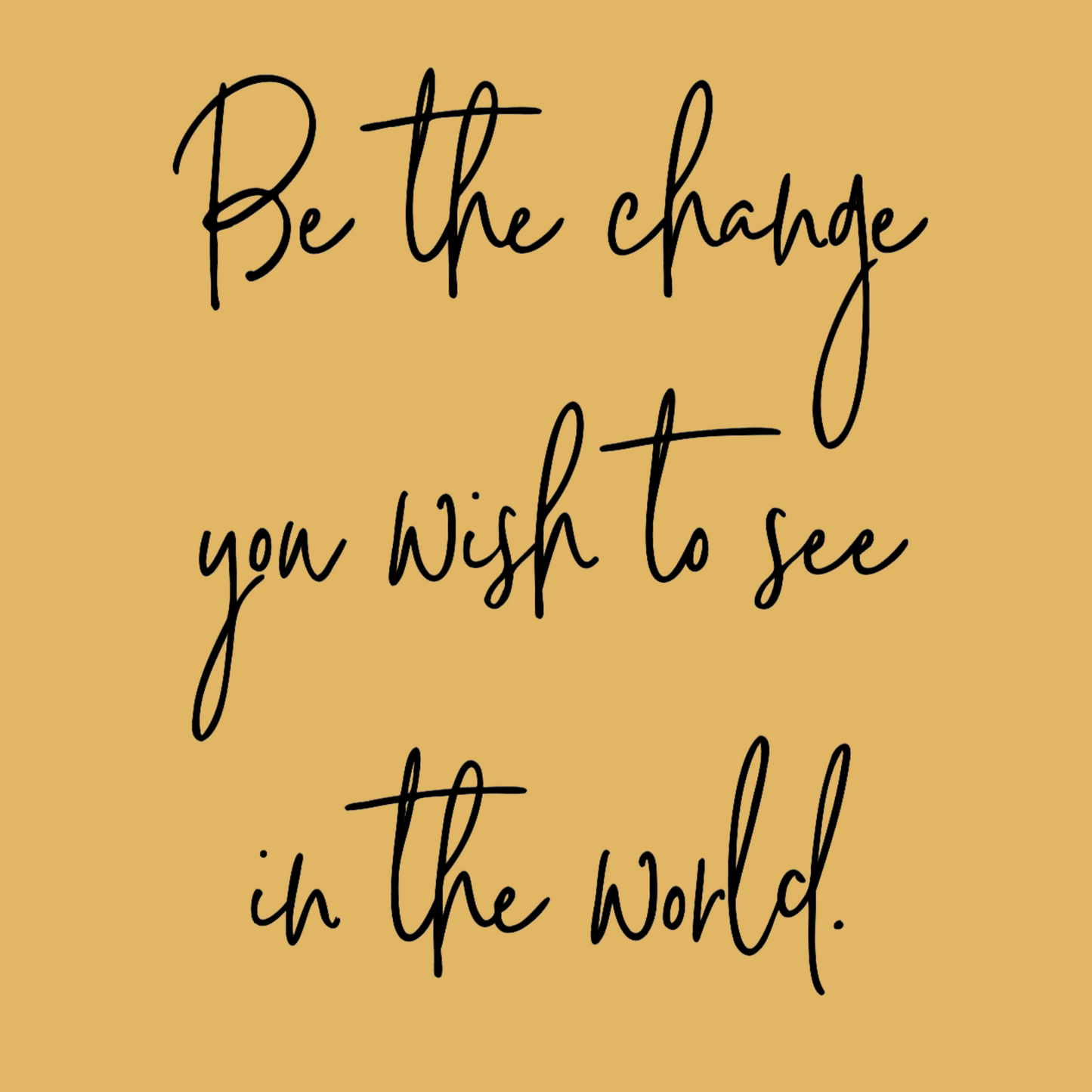 Be The Change Hooded Sweatshirt in a light yellow. The back has a black cursive writing saying "be the change you wish to see in the world." The front has a small flower with stem in black - pocket style. This is the back design in black on a light yellow background. Close up view of the design.