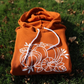 Fall Pumpkin - Hoodie - folded laying on grass