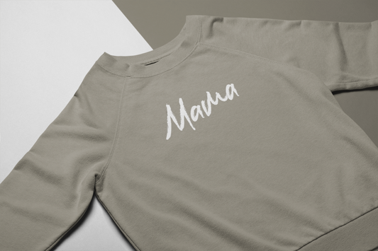 Green Mama - Pull Over Sweatshirt - front viewMama - Pull Over Sweatshirt in olive green with a white cursive modern font design with "mama" on it. This is the front view of the sweatshirt laid flat on a white and olive green background.