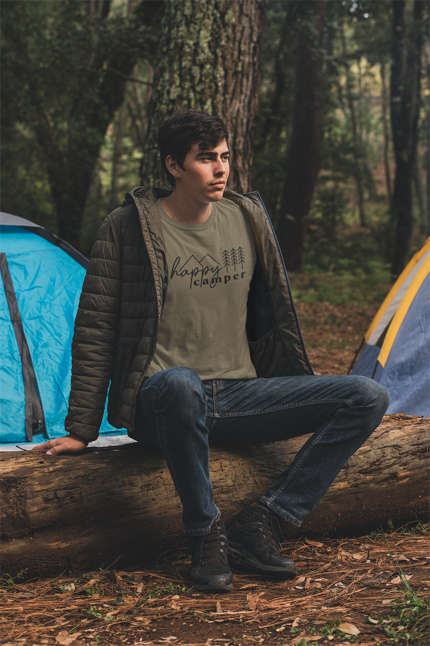 http://luckyludesigns.com/cdn/shop/products/t-shirt-mockup-of-a-young-man-camping-in-the-woods-30483.png?v=1682905268