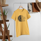 Rise Above The Storm Sunflower T-Shirt. The front has a half of a black sunflower on the left, with the right half having a quote of "rise above the storm and you will find the sunshine". This is a black design on a yellow shirt. This is the front view of the shirt hanging on a hanger on a clothing rack with items stylized around it.