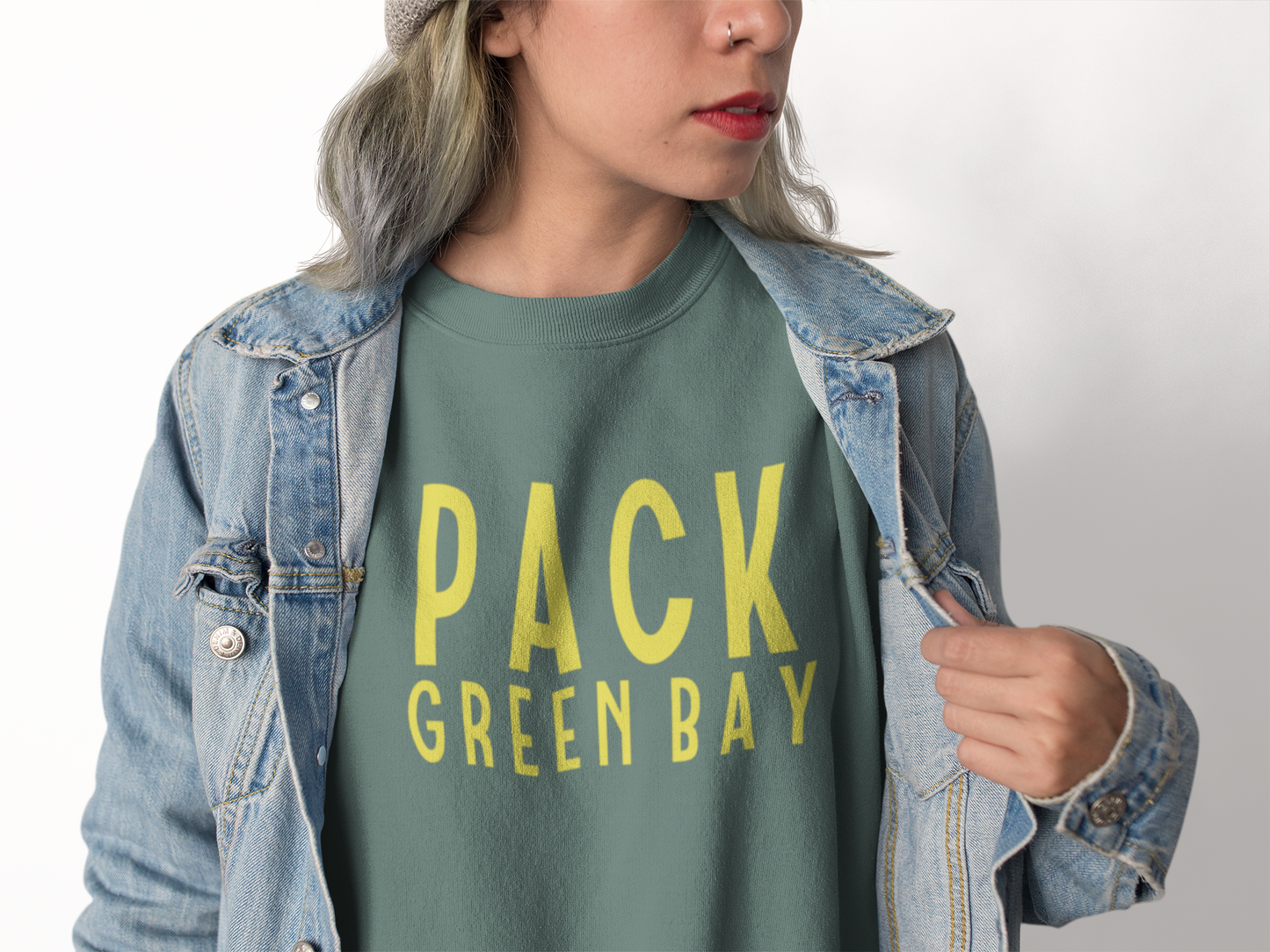 Green Bay Packers Crewneck Sweatshirt on a female model with a jean jacket over the top - posing