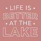 Life Is Better By The Lake design in white with a mauve background. Made for a better view of the design.
