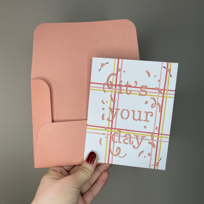 It’s Your Day Greeting Card - white pink and yellow striped card with pink background and pink envelope